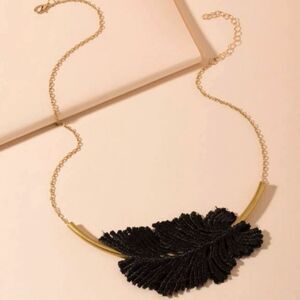 Bohemian gold feather necklace